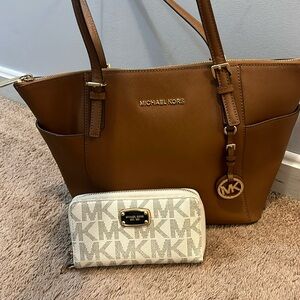 Brown Michael Kors hand bag and wallet